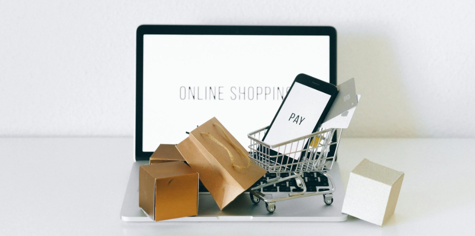 A Miniature Shopping Cart on MacBook Laptop