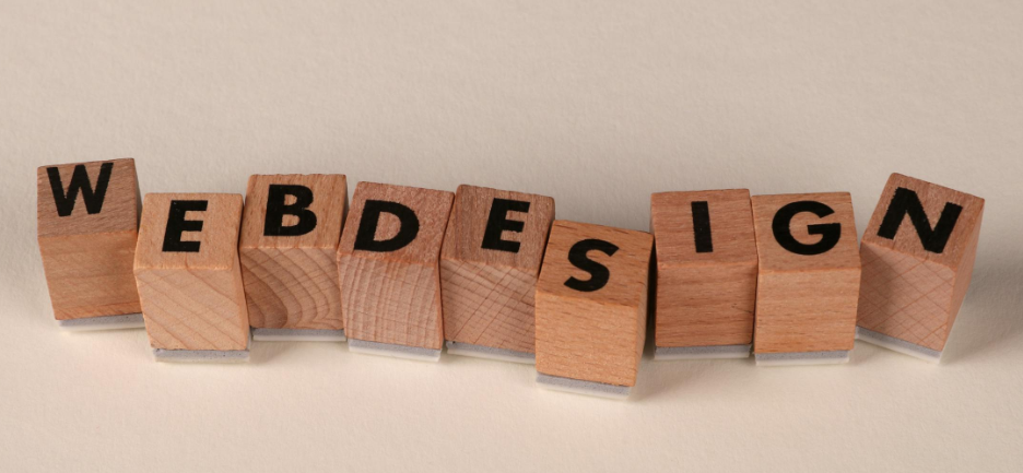 Wooden blocks spelling 'WEB DESIGN'