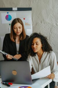 two people working